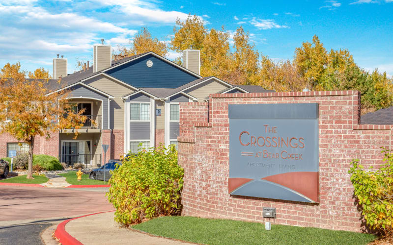 Monument Sign at The Crossings at Bear Creek Apartments in Lakewood, Colorado