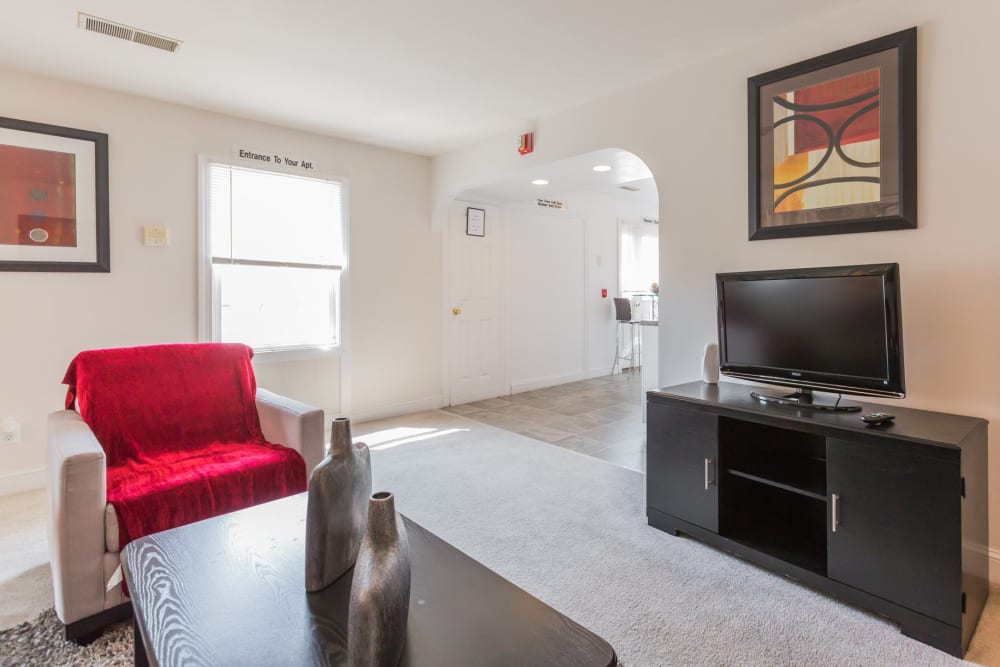 Furnished apartment living room at Village Square Apartments in Mount Holly, New Jersey