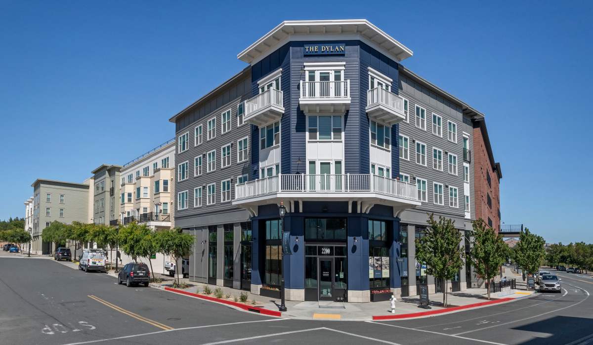 Corner street entrance at The Dylan Apartment Homes in Hercules, California