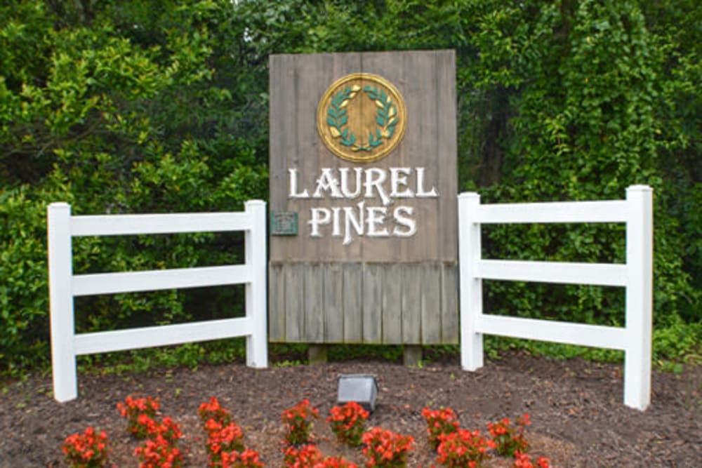 Entry way signage and garden of Laurel Pines Apartments in Richmond, Virginia