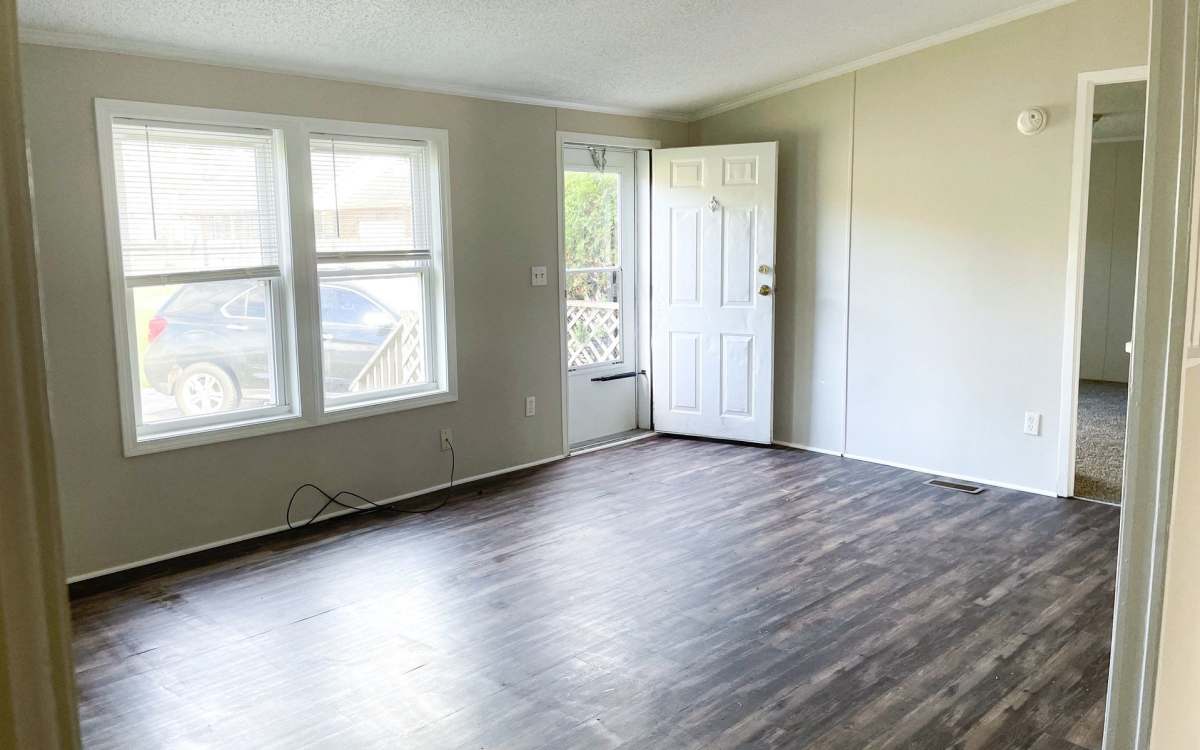 Well-lit apartment house entrance at Fairview Crossing in Scottsburg, Indiana