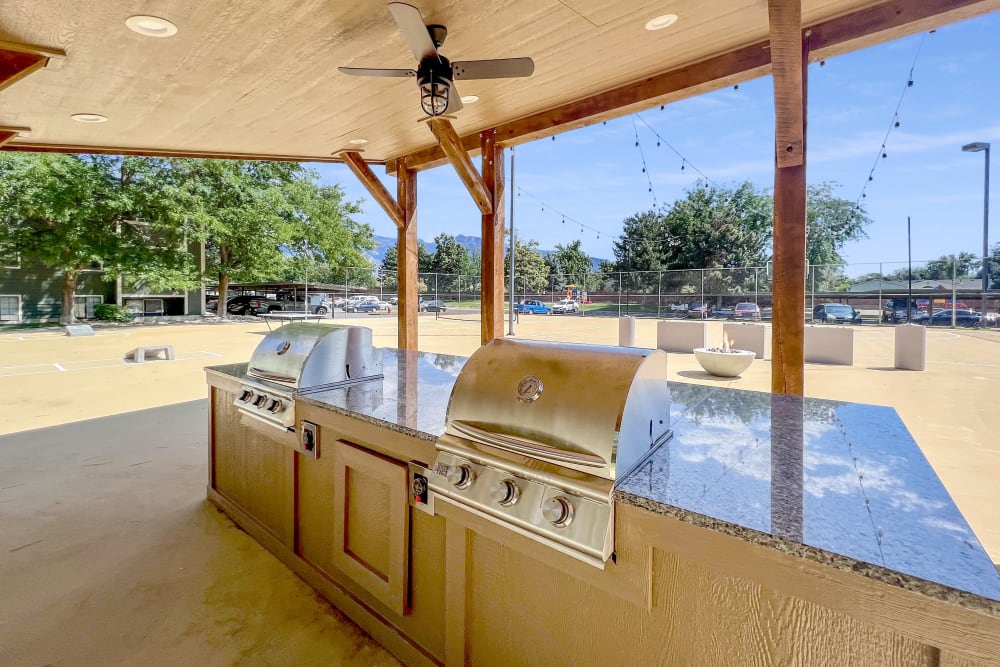 Covered BBQ at Sports Court at Royal Ridge Apartments in Midvale, Utah