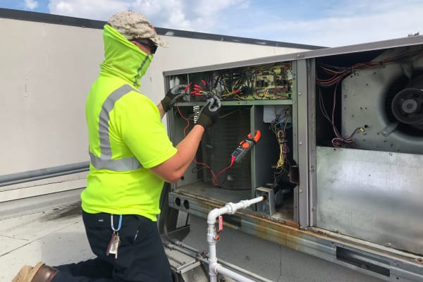 A worker looking at wires at Patriots Glen in Bellevue, Washington. 