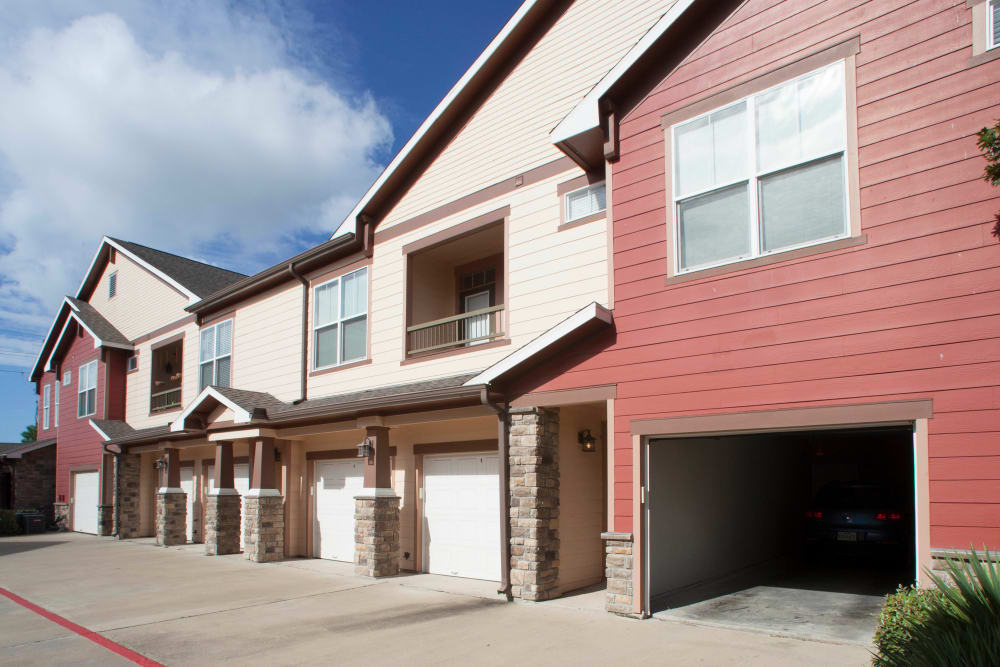 Private garages attached to resident building at Olympus Katy Ranch in Katy, Texas