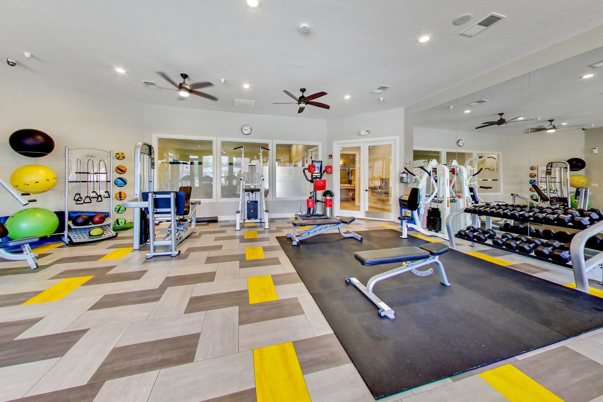 The 24-hour fitness center at Hawthorn Village Apartments in Napa, California