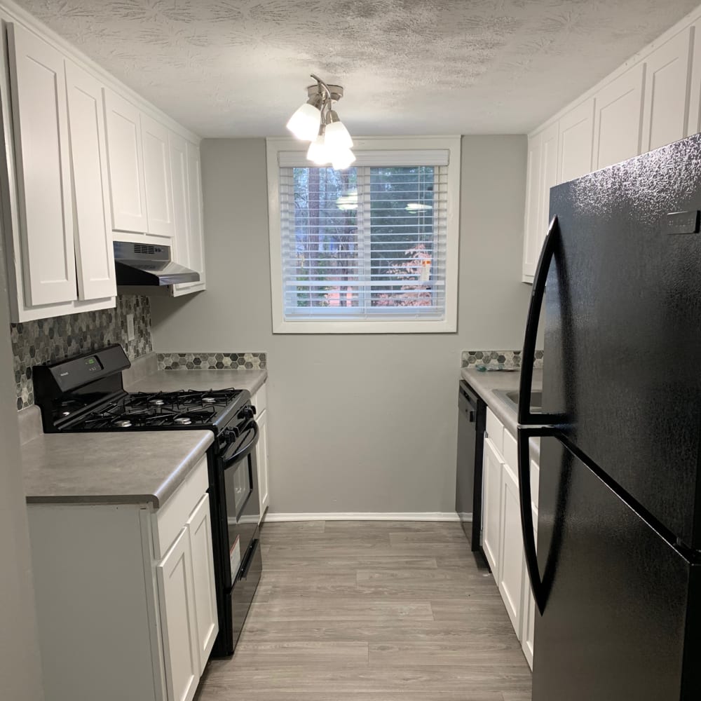 An apartment kitchen at Foxwood Apartments in Doraville, Georgia