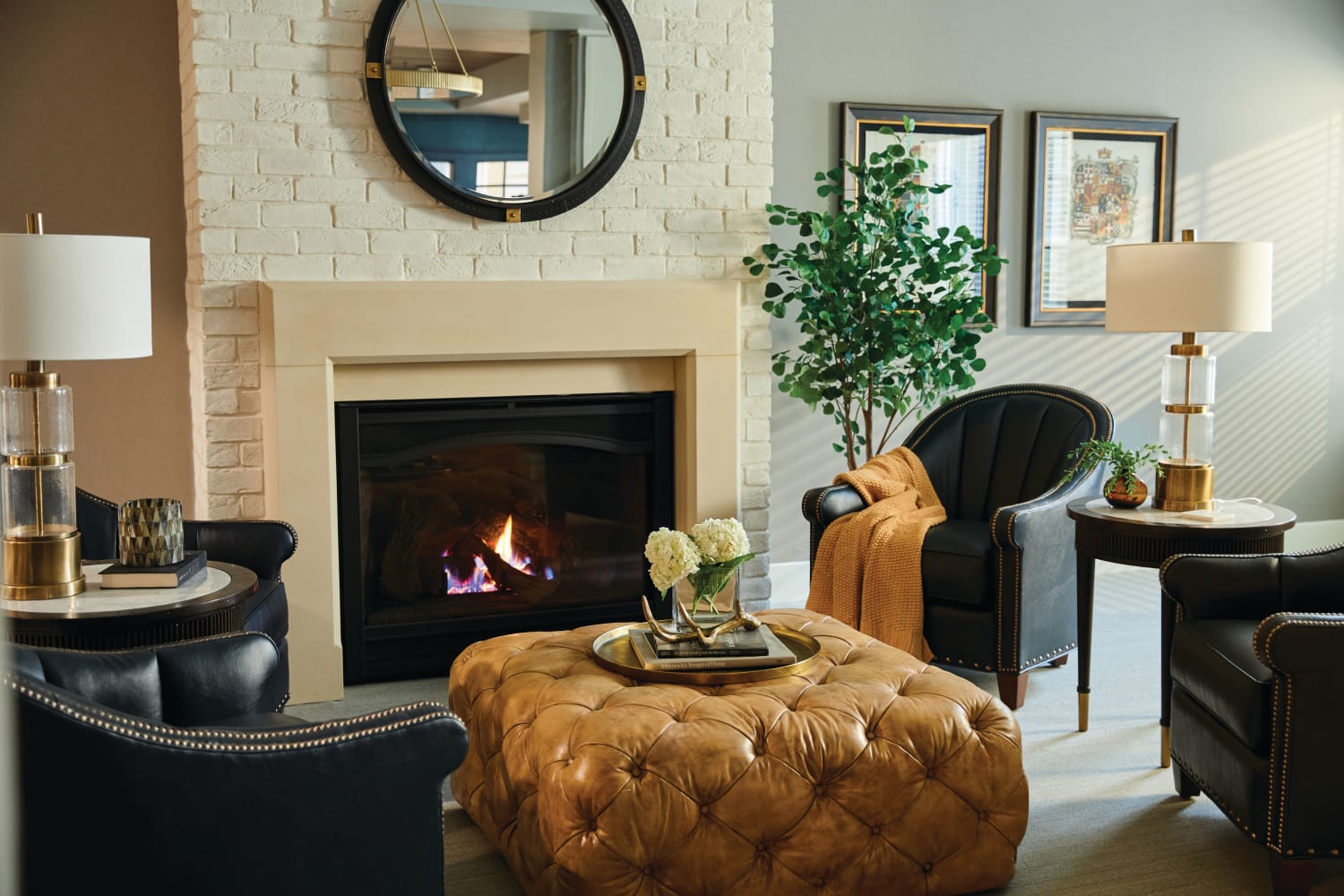 Fireplace lounge at Amira Lowry in Denver, Colorado