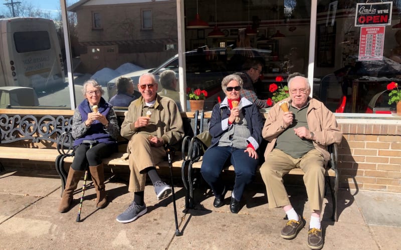 Happy seniors eating ice cream at Eastern Star Masonic Retirement Campus in Denver, CO