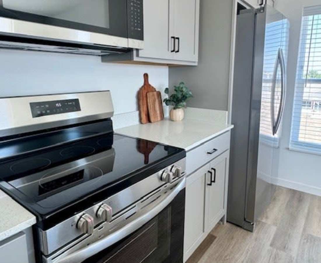 Stainless steel stove with black cooktop at Pritchard Park Place in Racine, Wisconsin