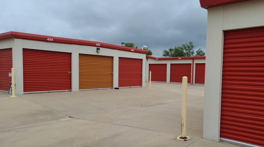 Red and orange storage units at KO Storage of Wichita Falls in Wichita Falls, Texas