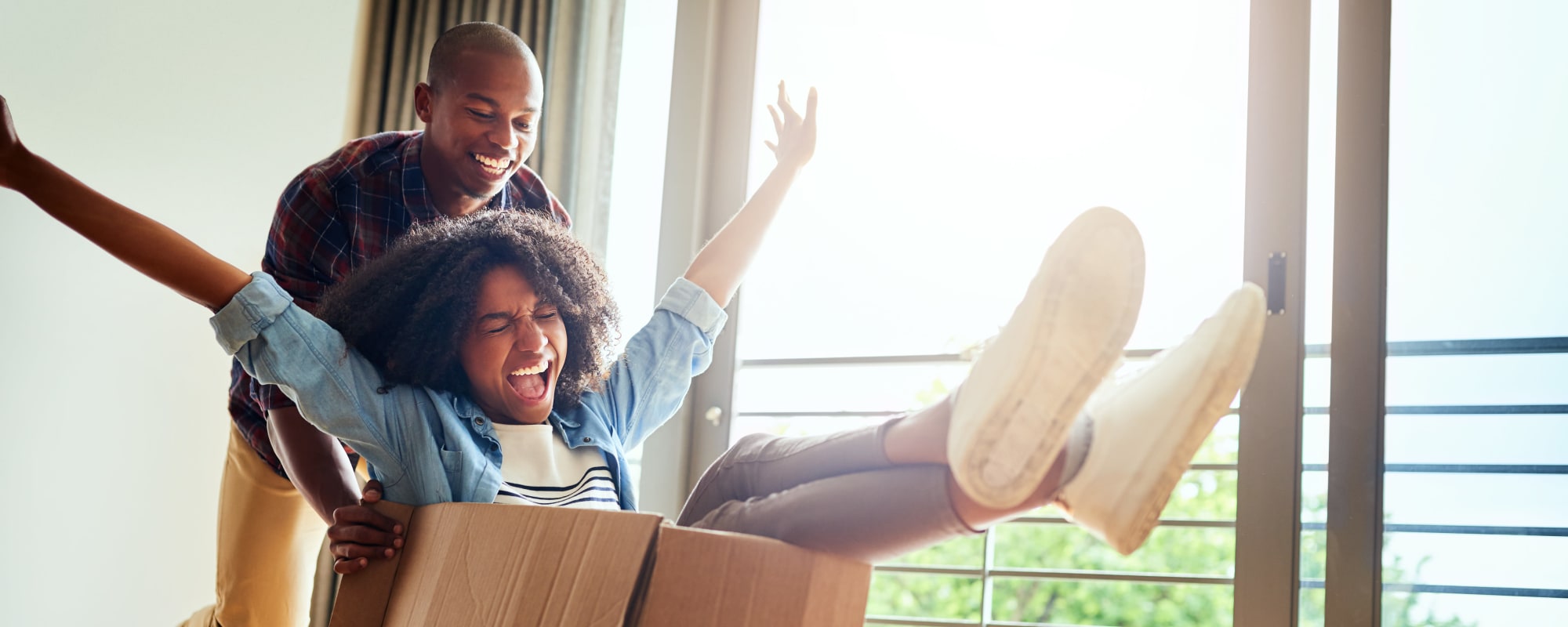 Family playing with boxes at A3 Storage Centers in Cedar Park, Texas