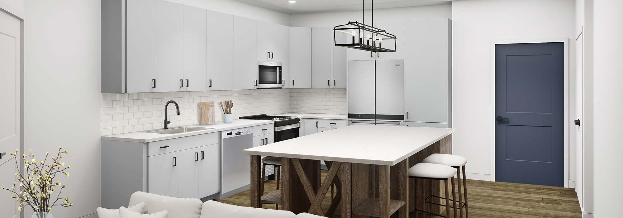 Living area with access to kitchen at Farmstead on Falls in Grafton, Wisconsin