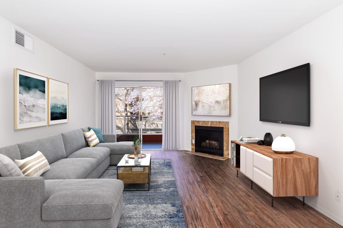 Spacious apartment with wood-style flooring at Marlon Manor Apartments, Los Angeles, California