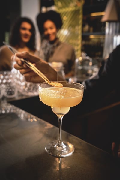 Residents enjoy cocktails near The Retreat at Thousand Oaks, Thousand Oaks, California