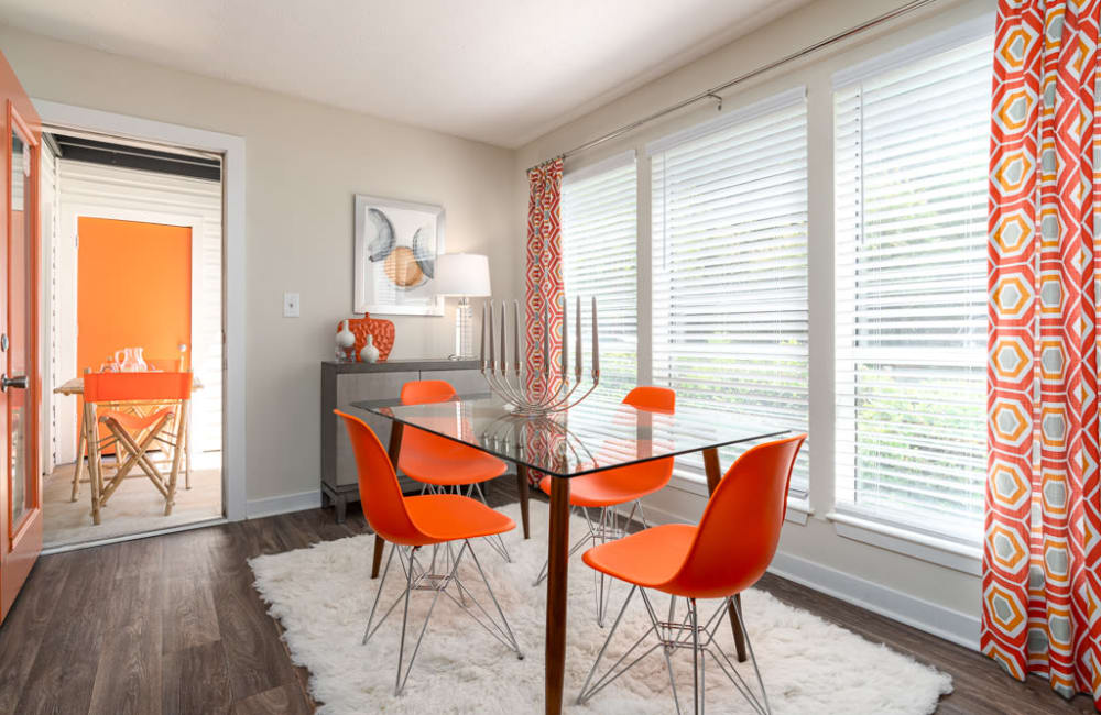 Large windows in an apartment dining room at The Hundred Exchange in Fayetteville, Georgia