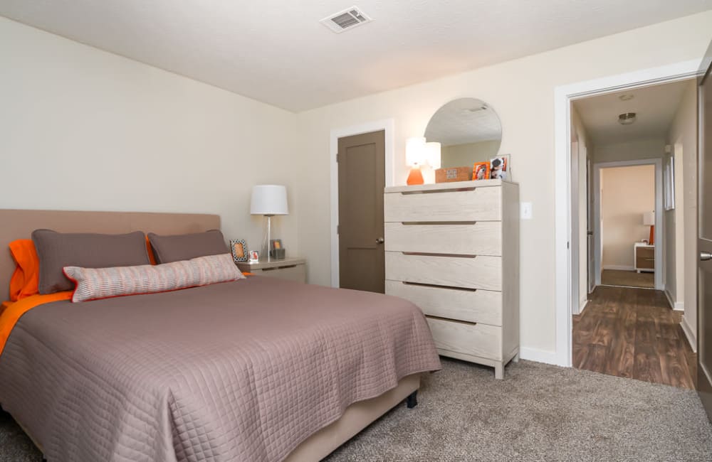 Cozy apartment bedroom at The Hundred Exchange in Fayetteville, Georgia