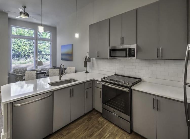 Fully-equipped kitchen at 300 Optimist Park in Charlotte, North Carolina
