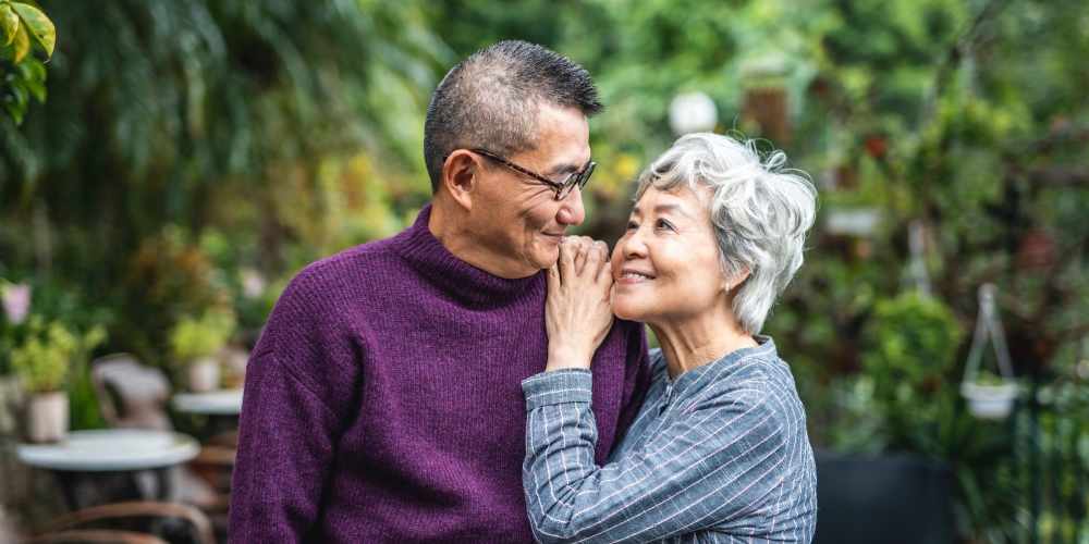 Resident hugging her husband at The Residences at Thomas Circle in Washington, District of Columbia