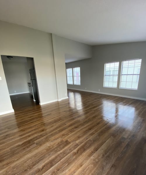 Wood-style flooring in a townhome at Clearleaf Crossing in Bryan, Texas