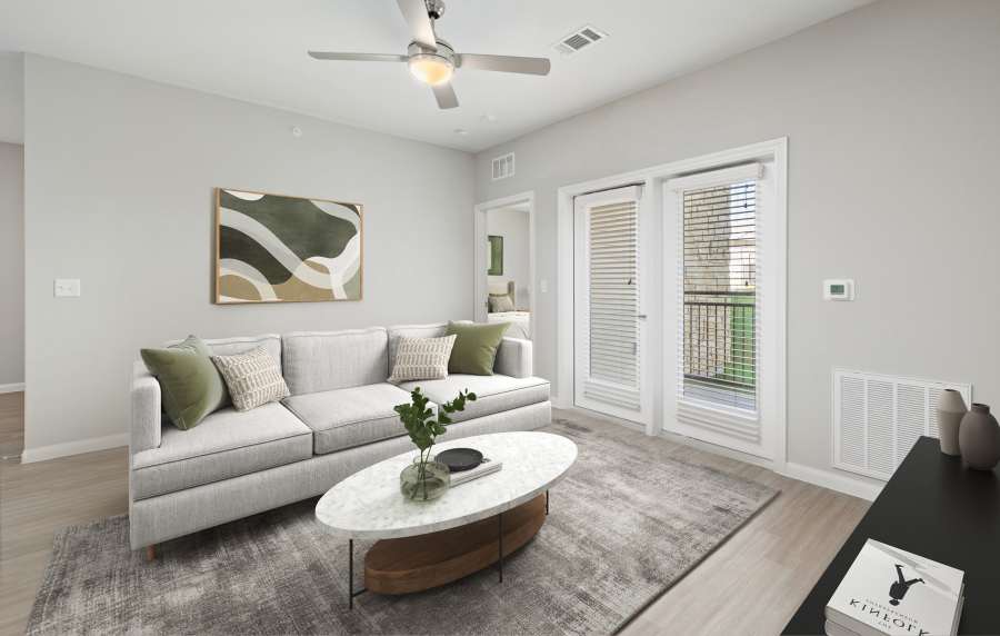 Unfurnished living room with a ceiling fan at Preserve at Gresham Lake in Raleigh, North Carolina