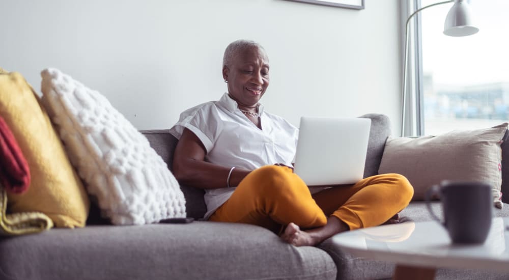 A resident enjoys her spacious apartment at Briarcliff Manor in Wheeling, West Virginia