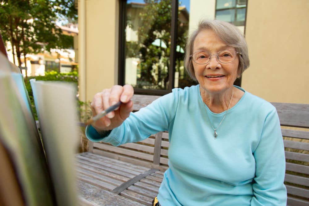 Resident painting at our senior living community in Gilroy