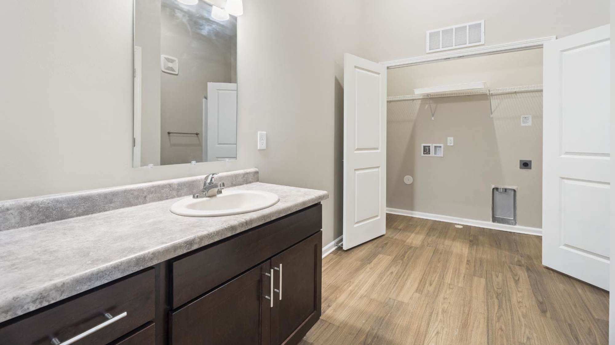 Spacious bathroom with sink and mirror at Lambert Landing II in Chester, Virginia