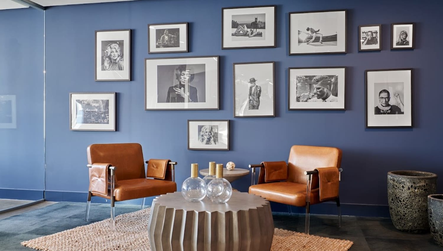 Leasing office with blue accent walls at Angelene Apartments in West Hollywood, California