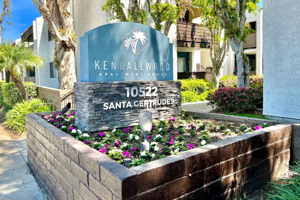Monument sign outside of Kendallwood Apartments in Whittier, California
