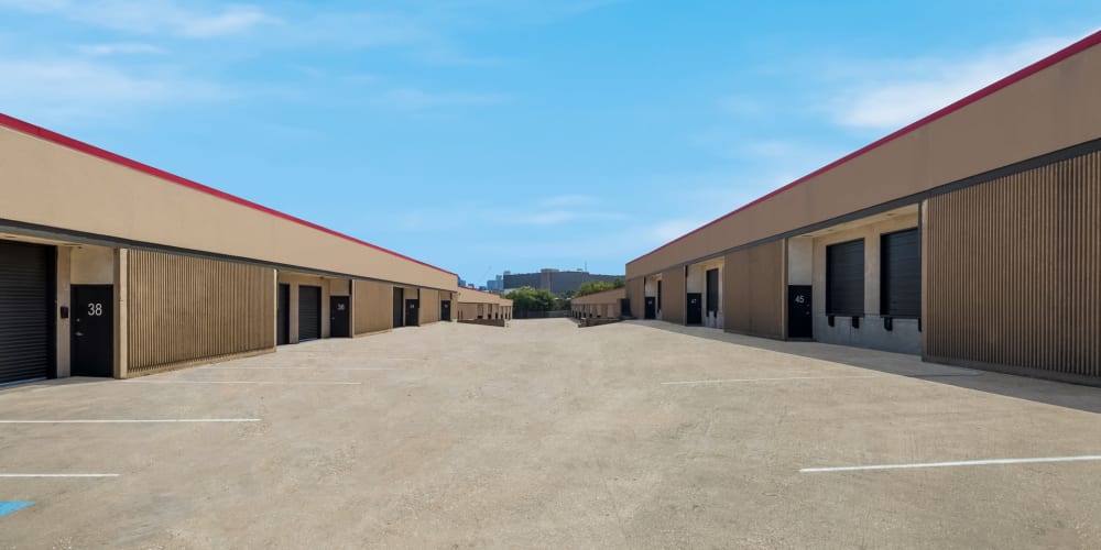 Loading bays and large drive-up storage units at StorQuest Economy Self Storage in Dallas, Texas