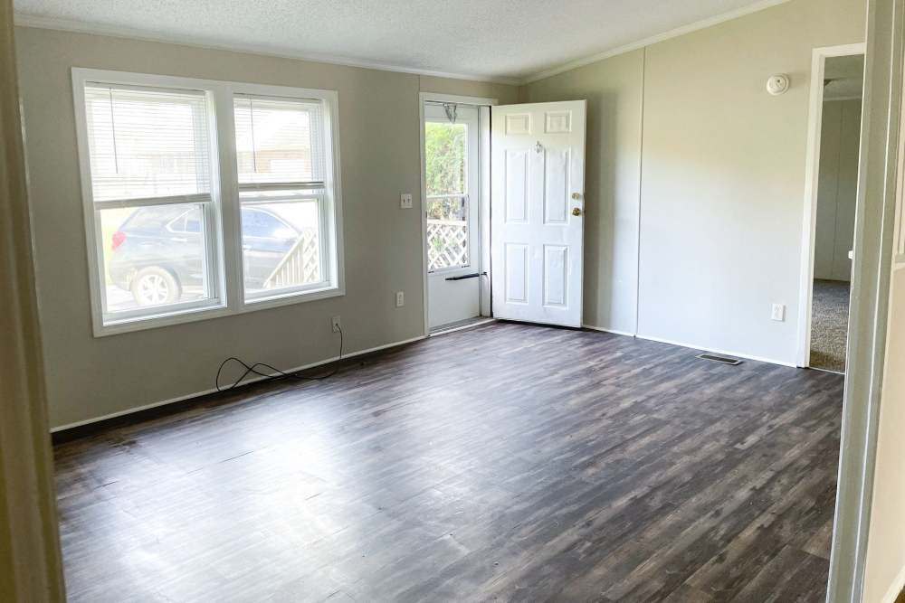 Well-lit apartment living space at Fairview Crossing in Scottsburg, Indiana
