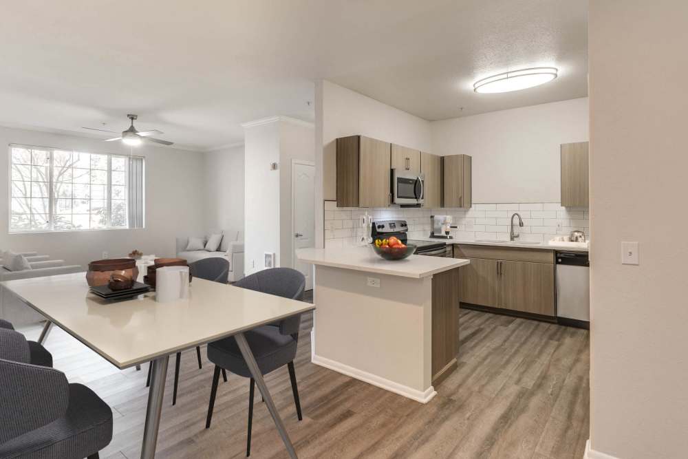 Dining area beside the kitchen at The Grove at Orenco Station in Hillsboro, Oregon