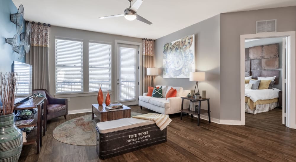 A furnished apartment living room and bedroom at Liberty Mill in Germantown, Maryland