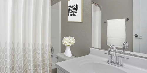Bright bathroom in model home at The Aurora Apartments in Sparks, Nevada