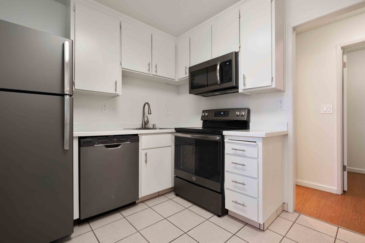 An apartment kitchen at Village of Taxco in San Jose, California