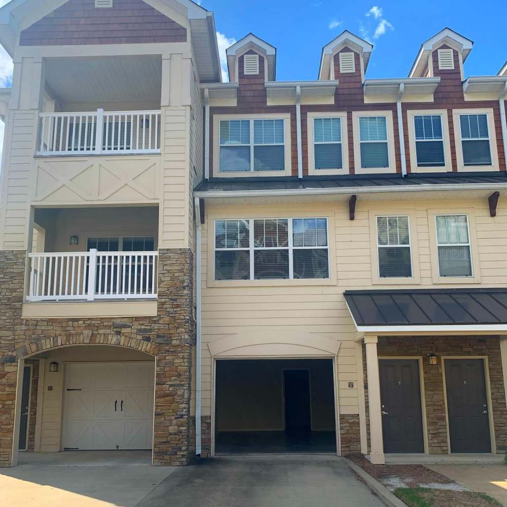 Entrance view of apartments with garages available at Preserve At Columbus Park in Columbus, Georgia