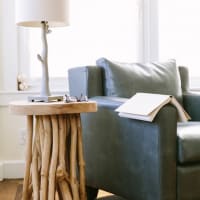 Couch and side table at Barrett Apartment Homes in Garland, Texas