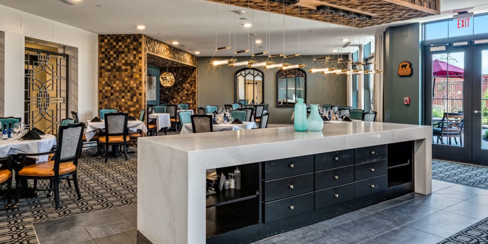 Spacious dining room with plenty of seating at Anthology of Town and Country in Town and Country, Missouri