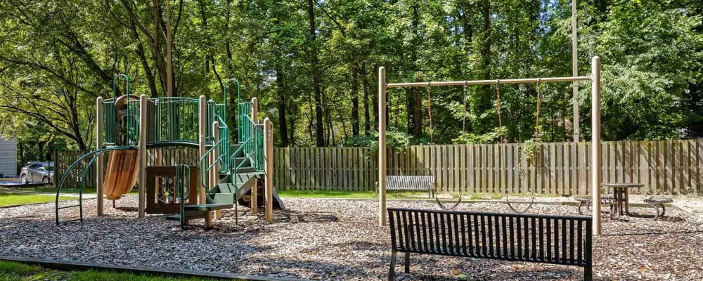 An onsite playground and benches at Hunt Club in Gaithersburg, Maryland