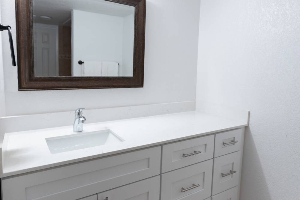 Apartment bathroom at Lakeshore Villa Apartments in Rowlett,Texas