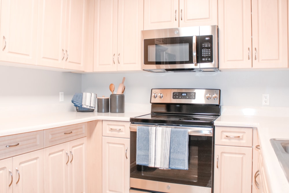 Gourmet kitchen with stainless-steel appliances at K Street Flats Apartment Homes in Berkeley, California