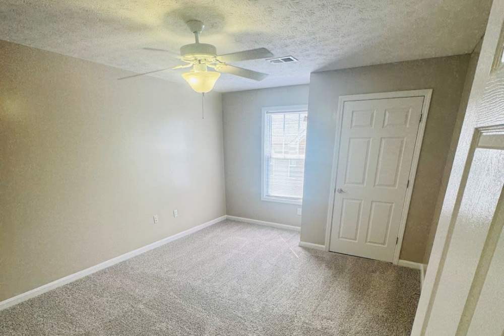 Bedroom with ceiling fan at Gleneagles Apartments in Lexington,Kentucky
