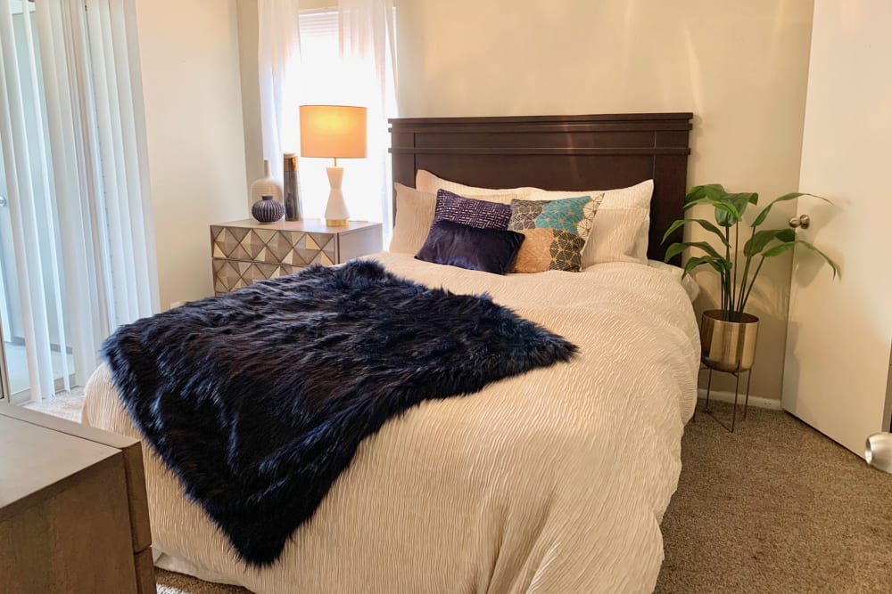 Cozy bedroom at Oak Ridge Apartments in San Antonio, Texas
