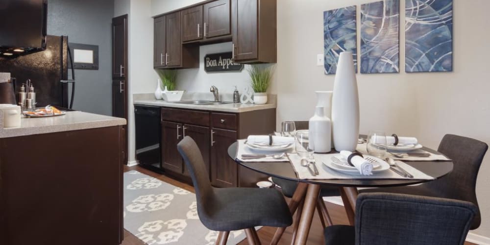 Beautifully decorated kitchen and dining area at The Landings at Steeplechase in Houston, Texas