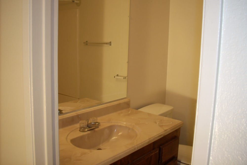 Model bathroom at El Potrero Apartments in Bakersfield, California