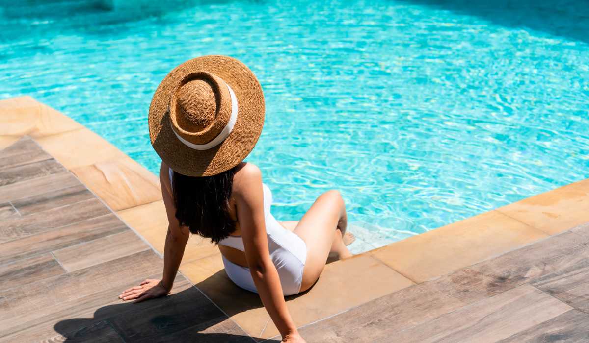Resident woman at pool side at Timber Ridge Townhomes in Bay Minette, Alabama