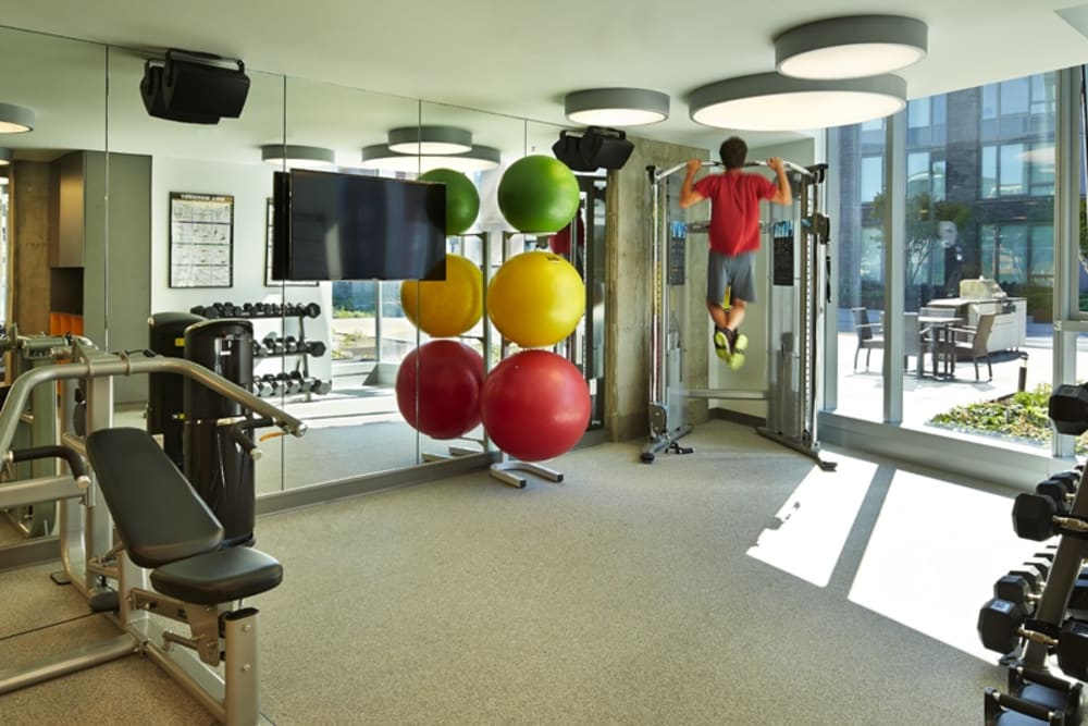 Well equipped fitness center for residents at The Nolo at Stadium Place in Seattle, Washington