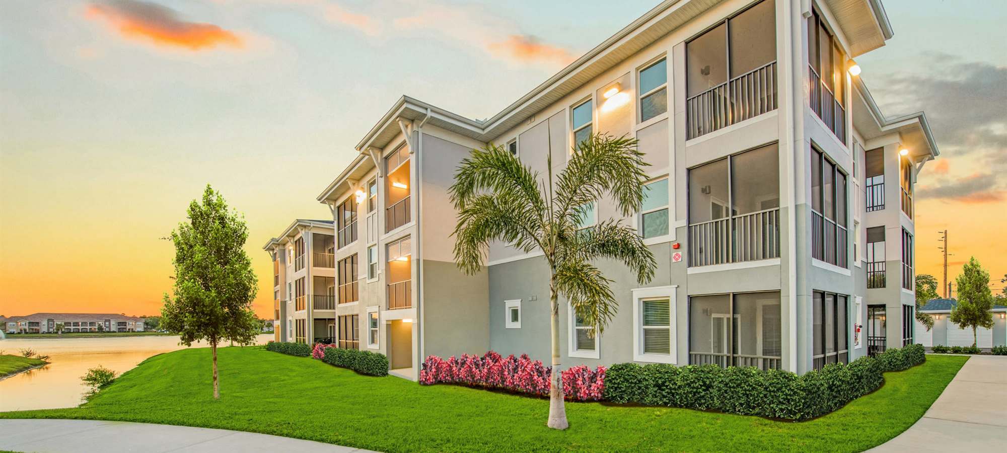 Exterior of an apartment with private patios and balconies at AMP Residential in Grand Rapids, 