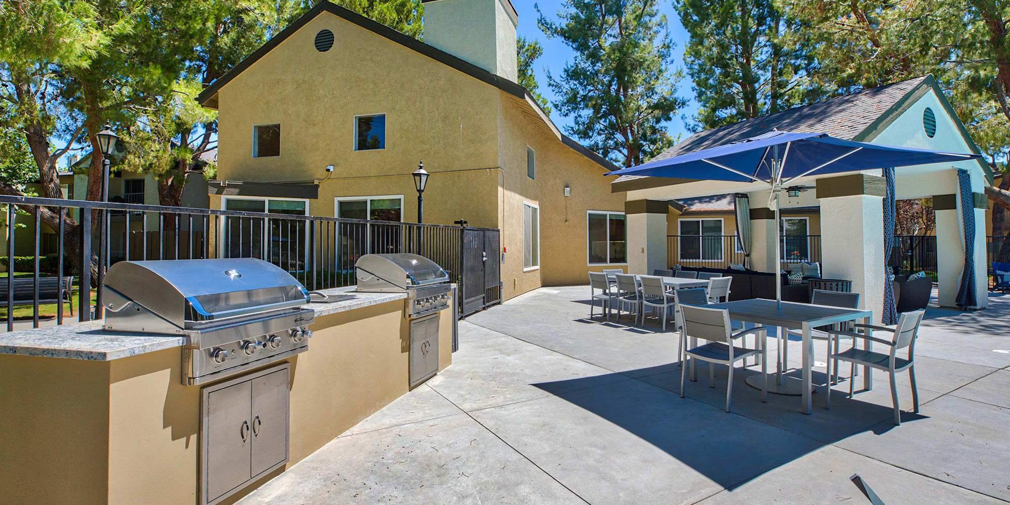 Outdoor BBQ and dining area at Mountain Vista in Victorville, California