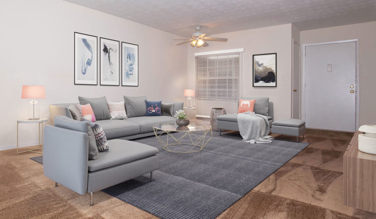 A spacious living room in an apartment at Commons at Briarwood Park in Brookhaven, Georgia